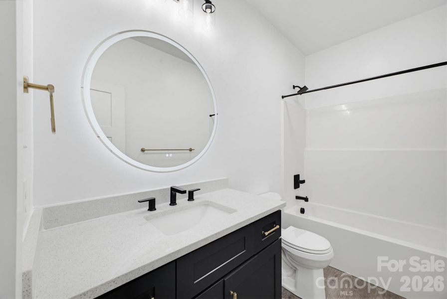 Furnished interior view inside a new home in , Hickory (Image 9).