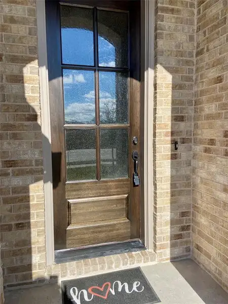 Impressive Mission style 8 ft front door welcomes guests Impressive Mission style 8 ft front door welcomes guests