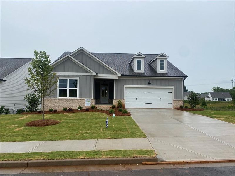 Front exterior of a new home in , Jefferson, GA, highlighting curb appeal (Image 1).