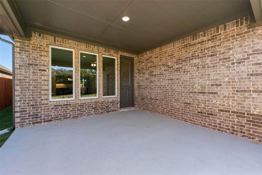 Exterior details and patio area of a home in Morningstar, Aledo (Image 23).