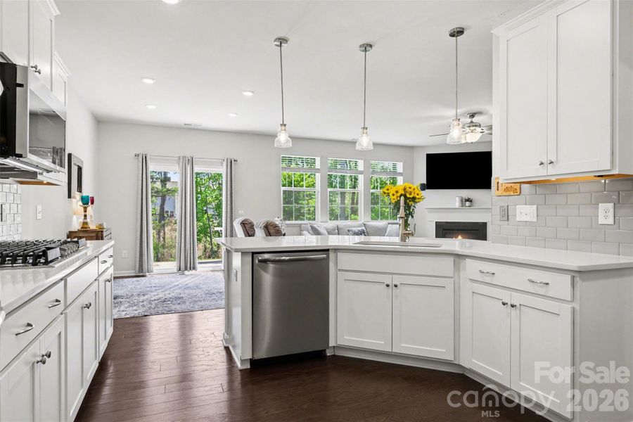 Open floorplan kitchen with breakfast nook seating