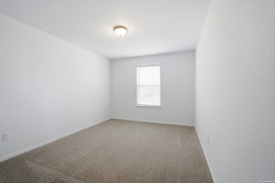 Spacious, unfurnished interior of a new home in Hennersby Hollow, San Antonio (Image 30).