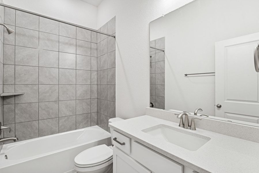 Furnished interior view inside a new home in Meridiana 55' Homesites, Manvel (Image 7).