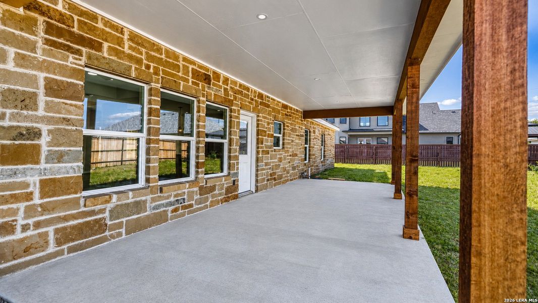 Exterior details and patio area of a home in , Uvalde (Image 16).