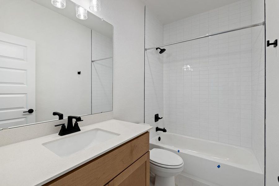 Furnished interior view inside a new home in Heritage, Dripping Springs (Image 12).