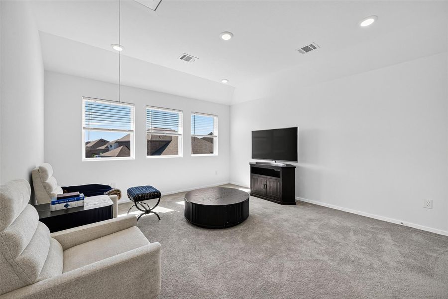 Spacious and cozy game room perfect for relaxation. Spacious and cozy game room perfect for relaxation.