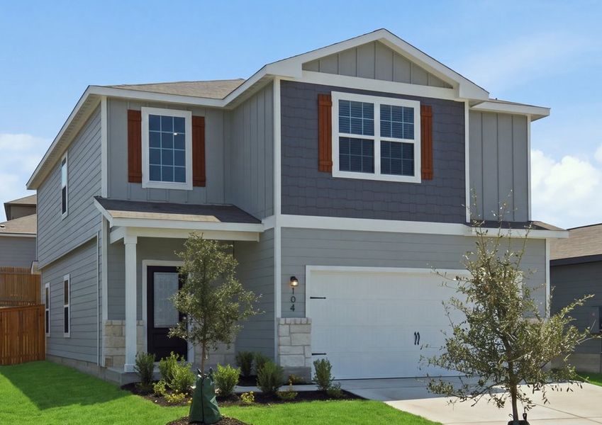 Two-story Torres floor plan front exterior featuring lap siding, a two-car garage, and landscaped front lawn. Two-story Torres floor plan front exterior featuring lap siding, a two-car garage, and landscaped front lawn.