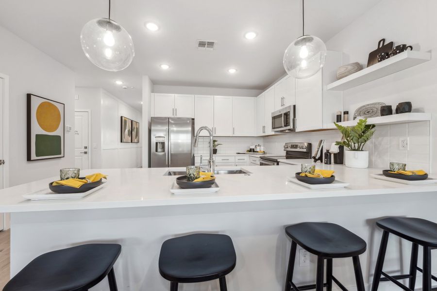 Kitchen with floating shelves to display pieces