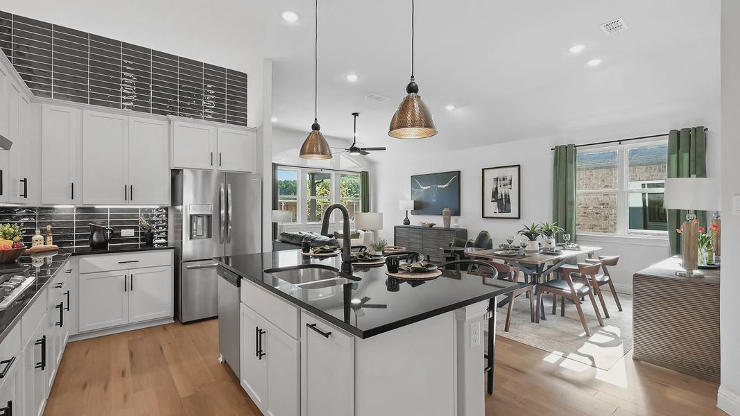 Model home photos of similar floorplans, not pictures of actual home.