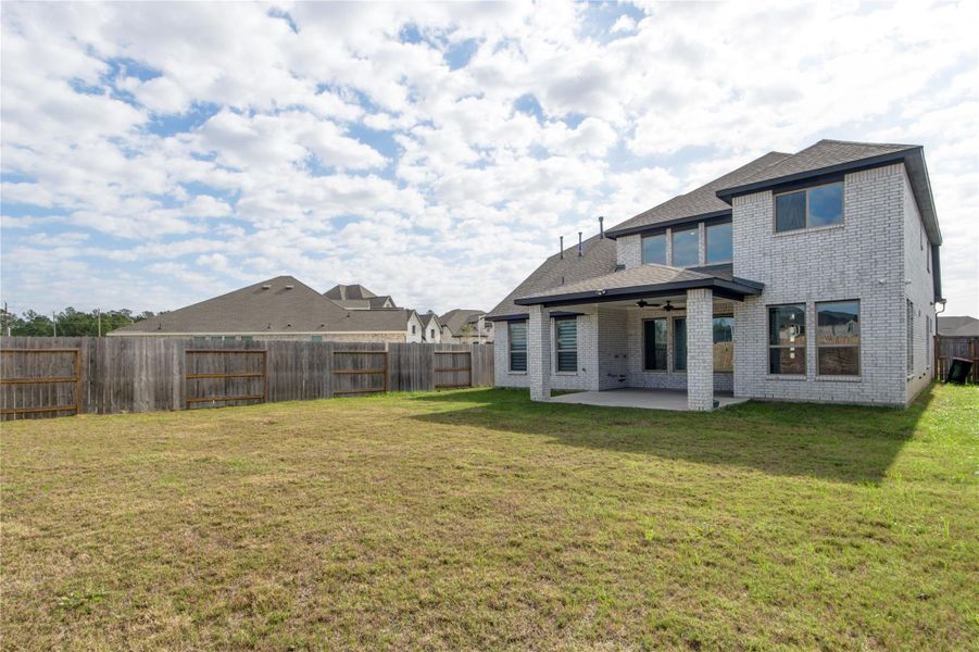 Exterior details and patio area of a home in , New Caney (Image 3). Exterior details and patio area of a home in , New Caney (Image 3).