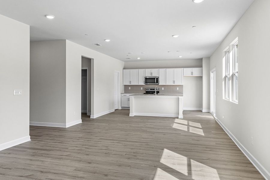 A large empty kitchen. A large empty kitchen.