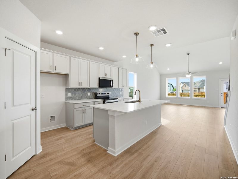 Furnished interior view inside a new home in Saddle Creek Ranch, Cibolo (Image 7).