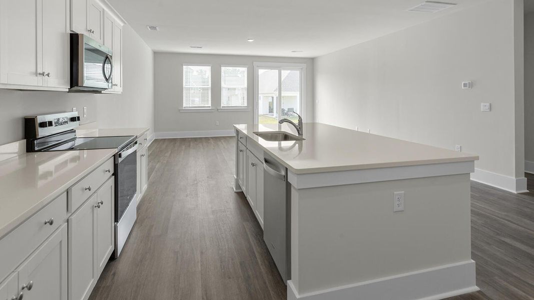 Furnished interior view inside a new home in Surfside Landing, Hubert (Image 9).