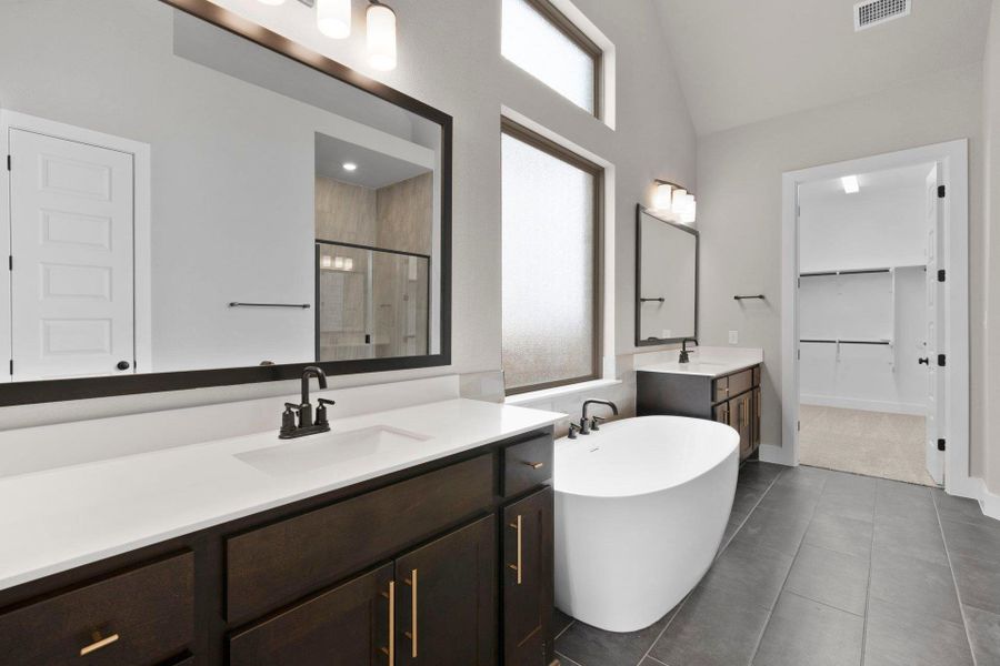 Primary Bath retreat with dual vanities & soaking tub