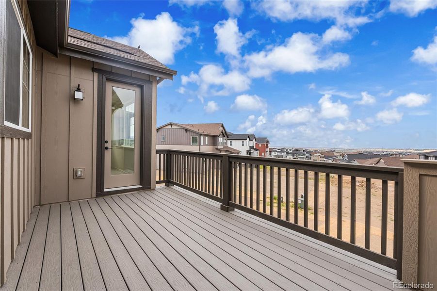 Front exterior of a new home in Sterling Ranch, Littleton, CO, highlighting curb appeal (Image 21).
