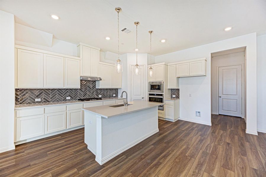 Brown Townhome Kitchen by Ashton Woods