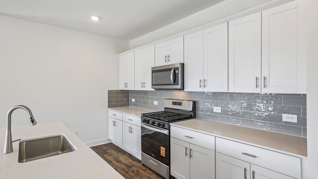 Furnished interior view inside a new home in Railhead, Cedar Creek (Image 6).