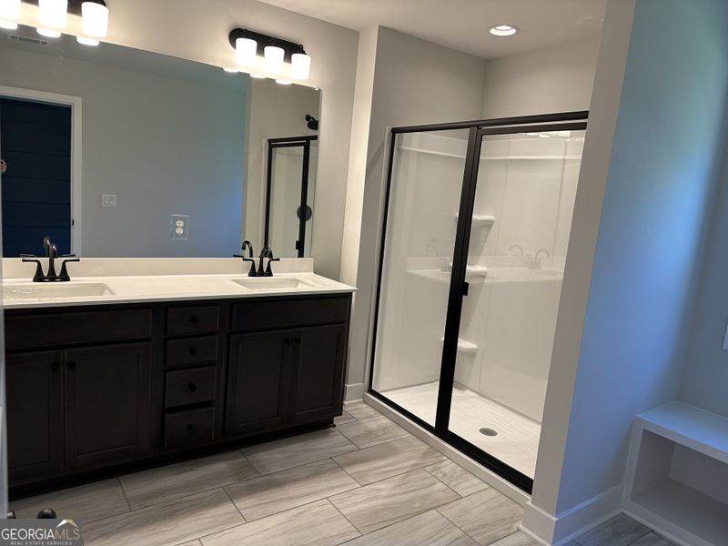 Furnished interior view inside a new home in Millstone at Mundy Mill, Gainesville (Image 19). Furnished interior view inside a new home in Millstone at Mundy Mill, Gainesville (Image 19).