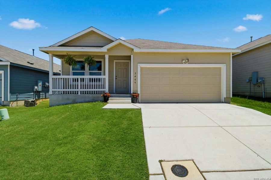 Front exterior of a new home in Sage Meadows, St. Hedwig, TX, highlighting curb appeal (Image 21). Front exterior of a new home in Sage Meadows, St. Hedwig, TX, highlighting curb appeal (Image 21).