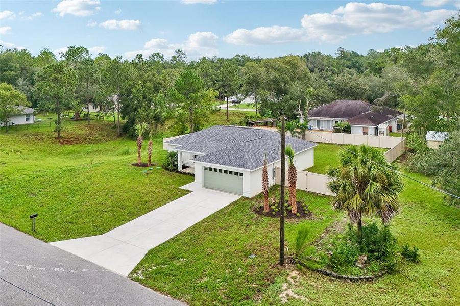 Front exterior of a new home in , Citrus Springs, FL, highlighting curb appeal (Image 24).