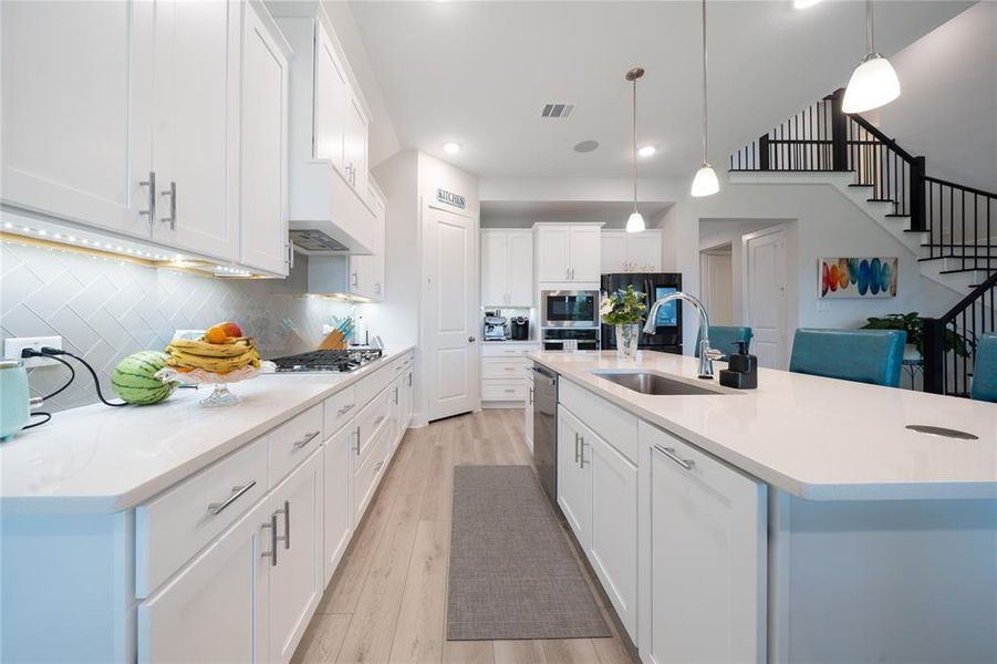 Furnished interior view inside a new home in , Little Elm (Image 19).