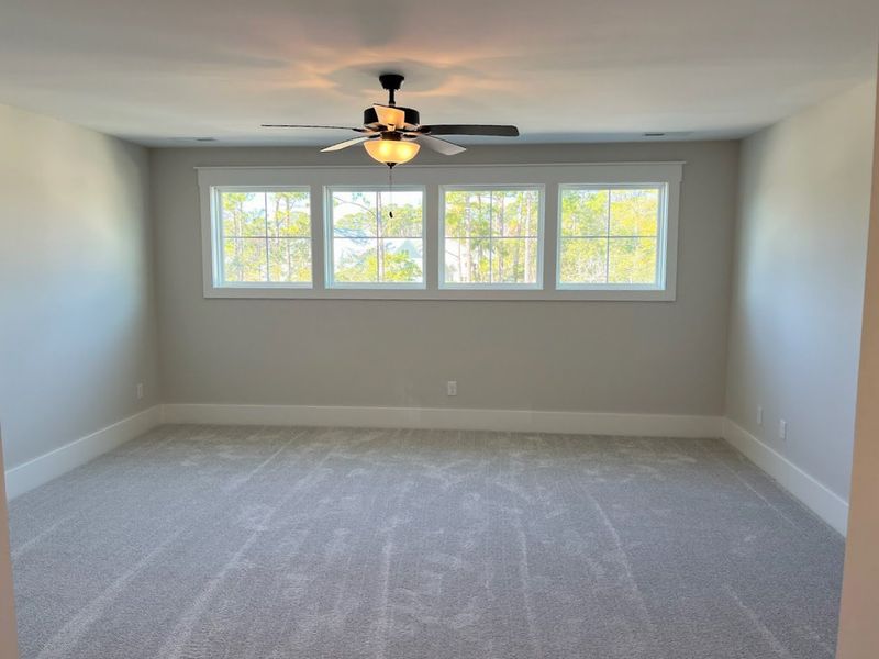 Spacious, unfurnished interior of a new home in Osprey Landing, Southport (Image 22).