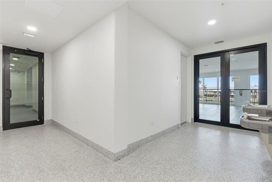 Spacious, unfurnished interior of a new home in Residences at Town Center, Madeira Beach (Image 22). Spacious, unfurnished interior of a new home in Residences at Town Center, Madeira Beach (Image 22).