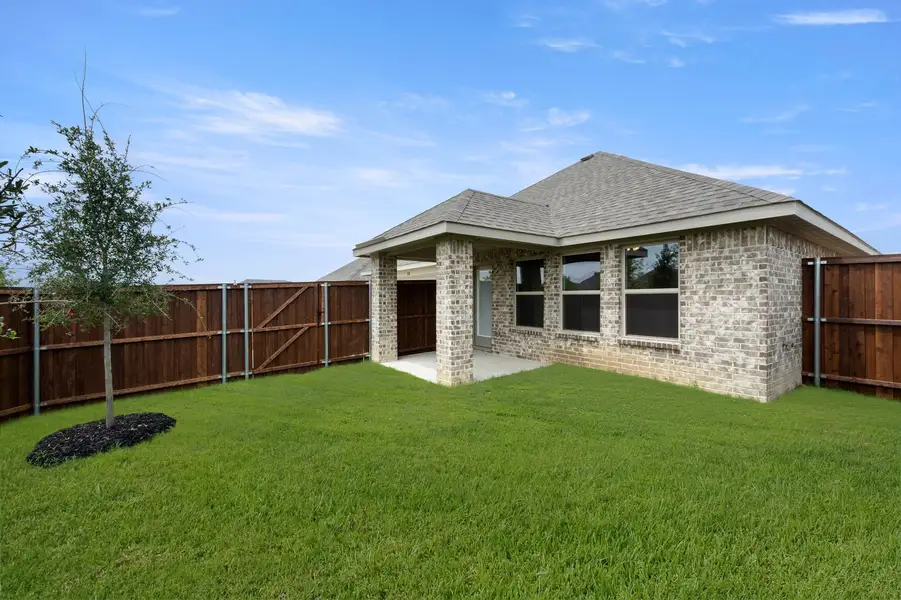 Front exterior of a new home in Redden Farms, Midlothian, TX, highlighting curb appeal (Image 25). Front exterior of a new home in Redden Farms, Midlothian, TX, highlighting curb appeal (Image 25).