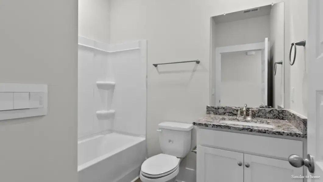 Furnished interior view inside a new home in The Highlands at Cedar Hill Landing, Navassa (Image 14).