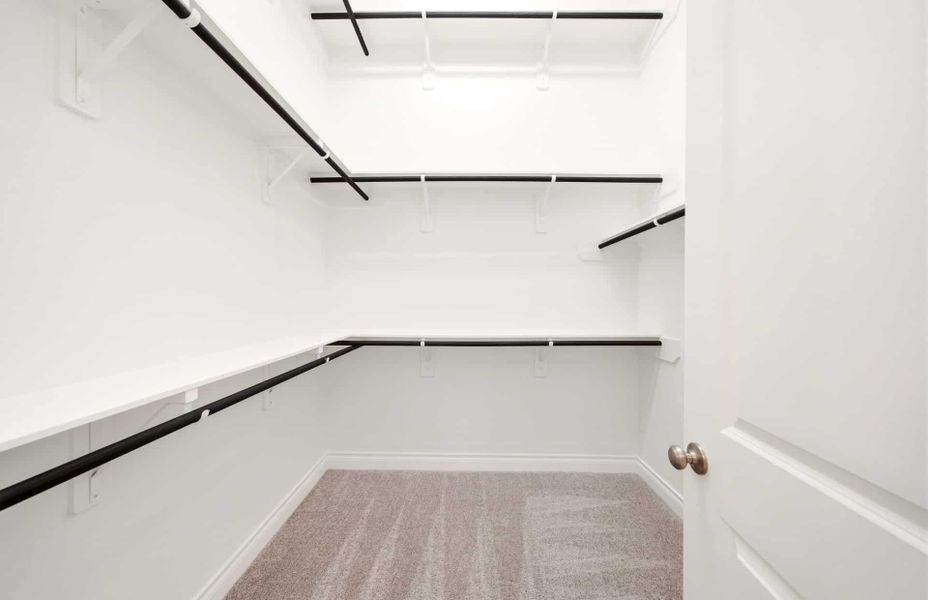 Spacious, unfurnished interior of a new home in The Woodlands Hills 65′, Willis (Image 52).