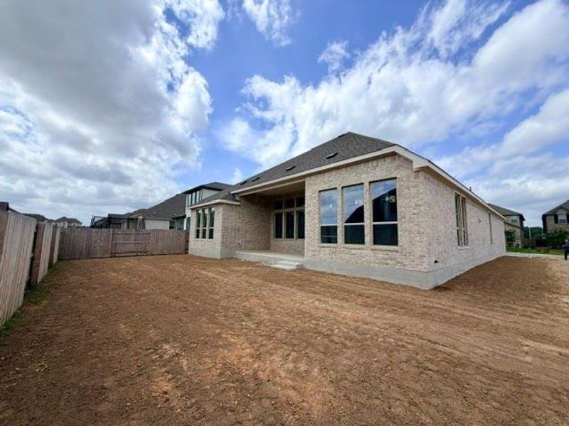 Exterior details and patio area of a home in Hawkes Landing, Leander (Image 3).