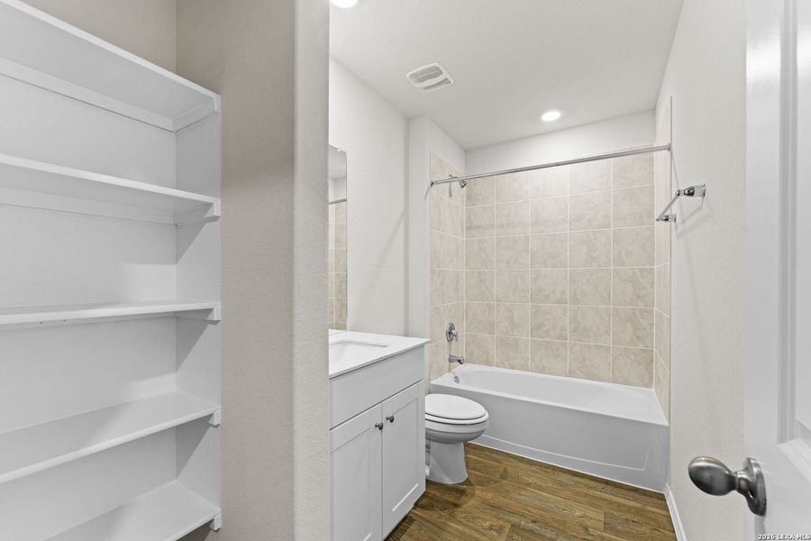 Furnished interior view inside a new home in Hunters Ranch, San Antonio (Image 8).