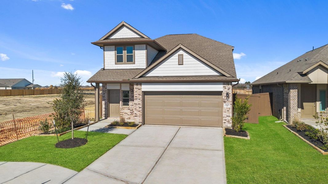Front exterior of a new home in Creekhaven, Rosharon, TX, highlighting curb appeal (Image 19).