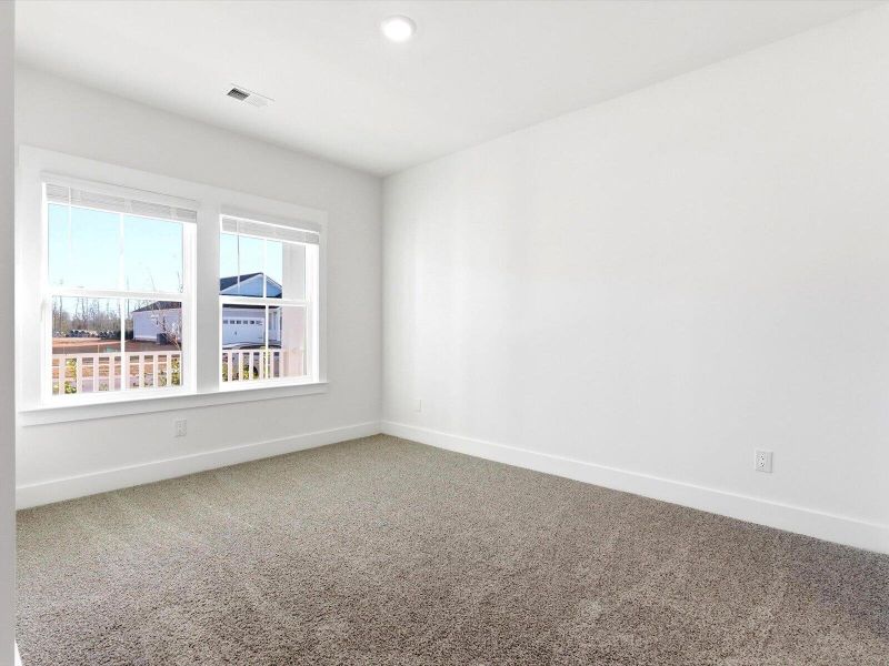 Spacious, unfurnished interior of a new home in The Coves at Lakes of Cane Bay, Summerville (Image 41). Spacious, unfurnished interior of a new home in The Coves at Lakes of Cane Bay, Summerville (Image 41).