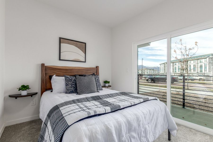 Furnished interior view inside a new home in The Commons at Victory Ridge, Colorado Springs (Image 18).