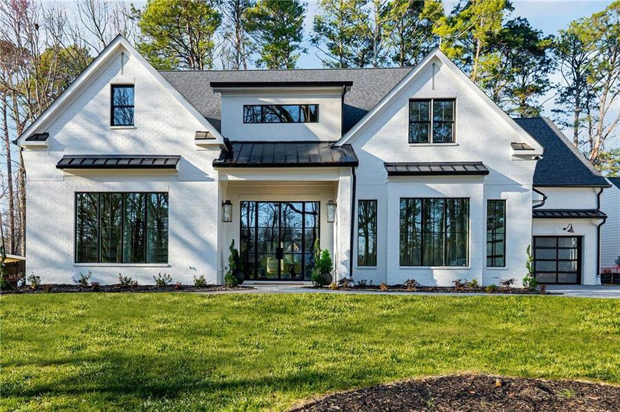 Front exterior of a new home in , Alpharetta, GA, highlighting curb appeal (Image 31).