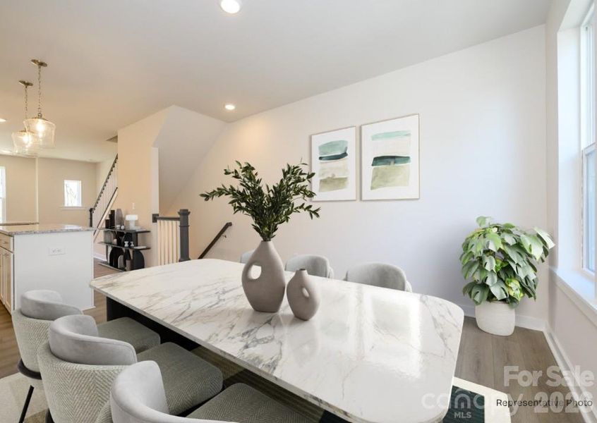 Furnished interior view inside a new home in Central Living at Craig, Charlotte (Image 3).