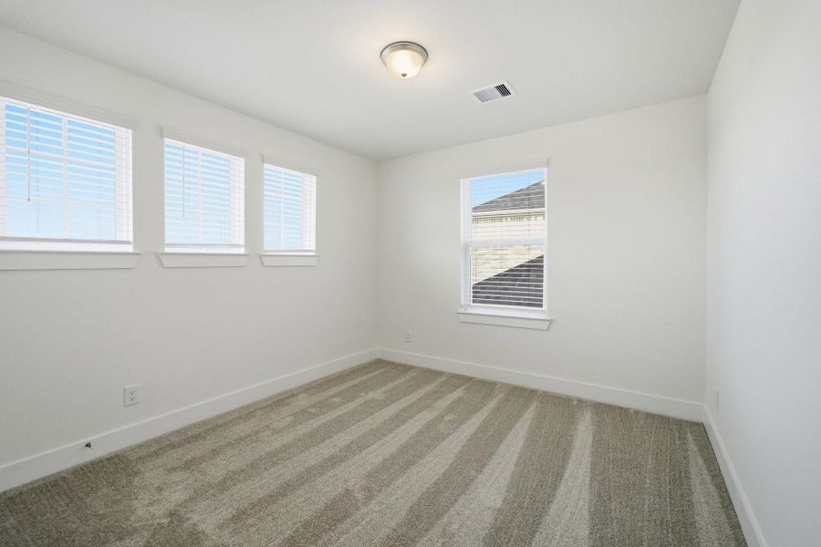 Spacious, unfurnished interior of a new home in Sunterra Lakes, Brookshire (Image 21).