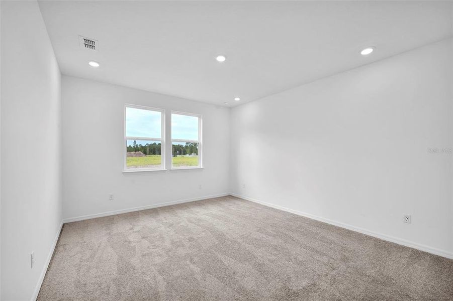Spacious, unfurnished interior of a new home in Seminole Palms, Palm Coast (Image 26).
