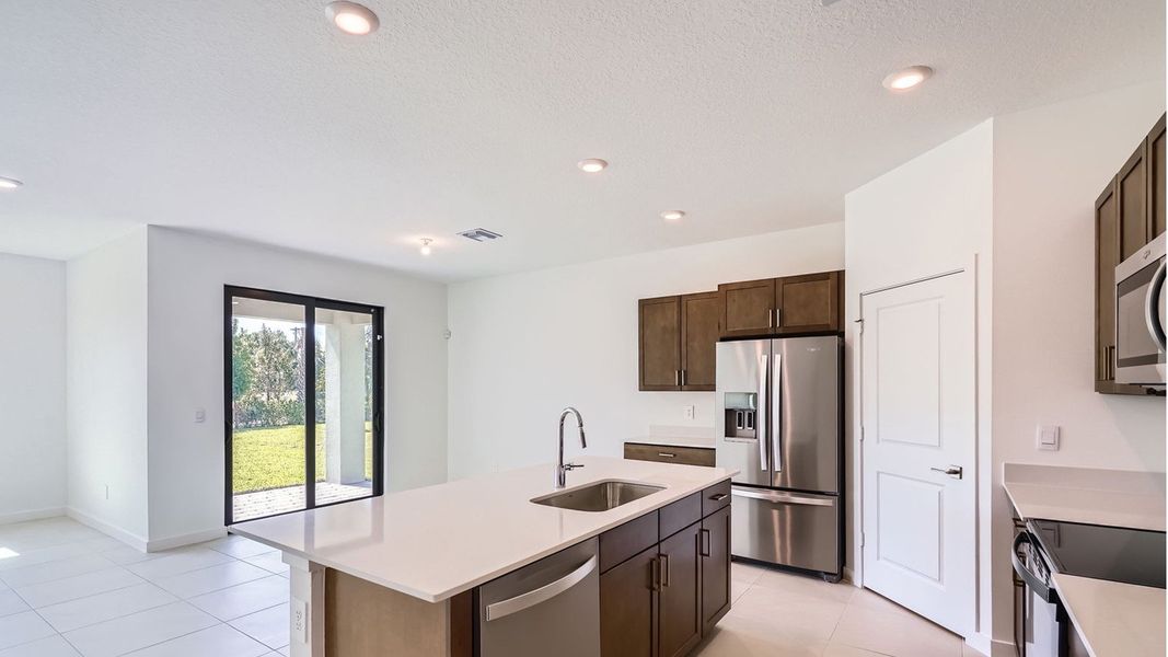 Representative furnished interior of a home built from the Cali by D.R. Horton in Twin Oaks, Stuart (Image 5).