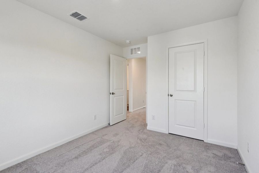 Representative unfurnished interior of a home built from the Compass by Starlight Homes in The Wilder, Adkins (Image 20).