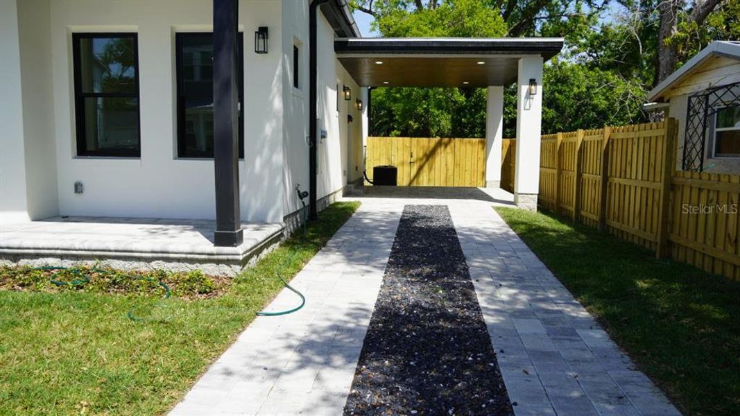 Front exterior of a new home in , Tampa, FL, highlighting curb appeal (Image 2).