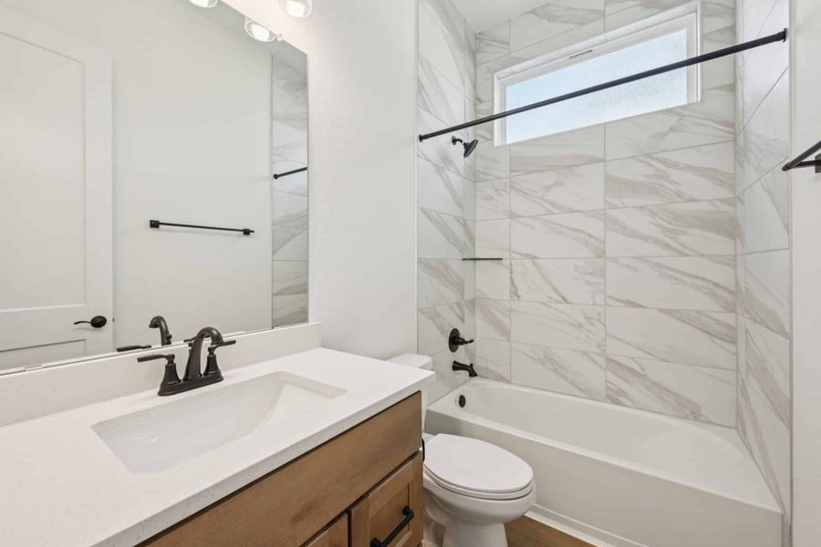 Furnished interior view inside a new home in The Woodlands Hills, Willis (Image 11).