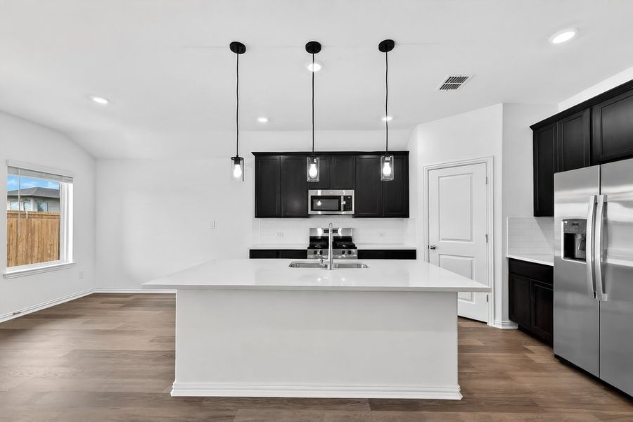 Furnished interior view inside a new home in Parks at Foster Crossing, Anna (Image 6).