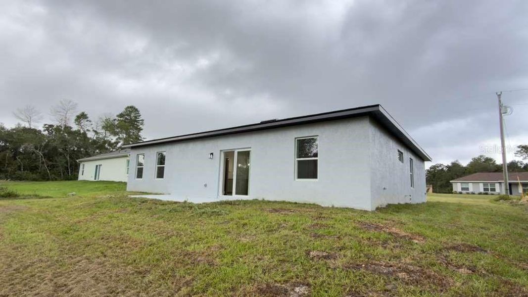 Exterior details and patio area of a home in , Ocala (Image 3).