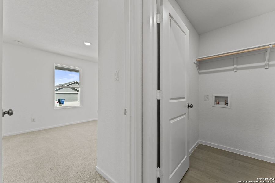 Spacious, unfurnished interior of a new home in Torian Village: Watermill Collection, San Antonio (Image 23).