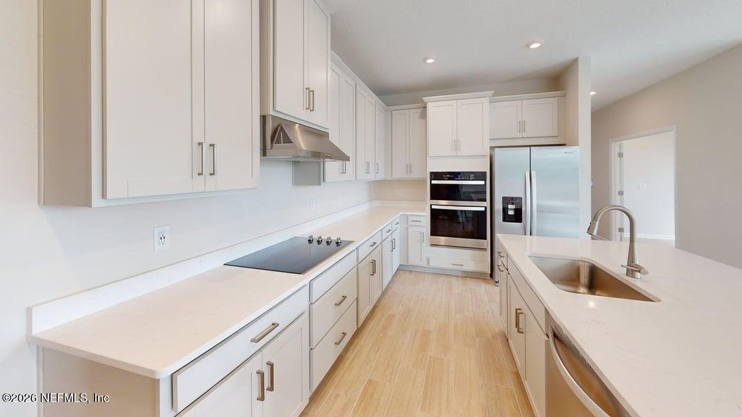 Furnished interior view inside a new home in Lakes at Bella Lago, Green Cove Springs (Image 8).
