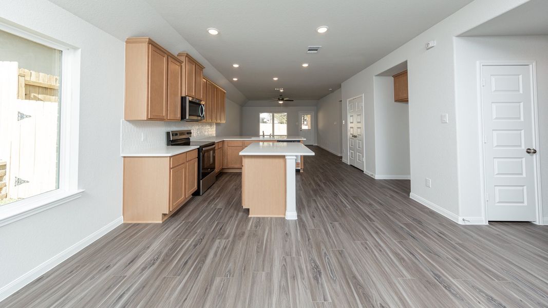 Dining Area to Kitchen and Family Room