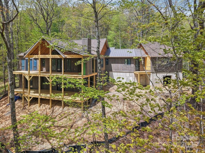 Front exterior of a new home in , Sapphire, NC, highlighting curb appeal (Image 1). Front exterior of a new home in , Sapphire, NC, highlighting curb appeal (Image 1).