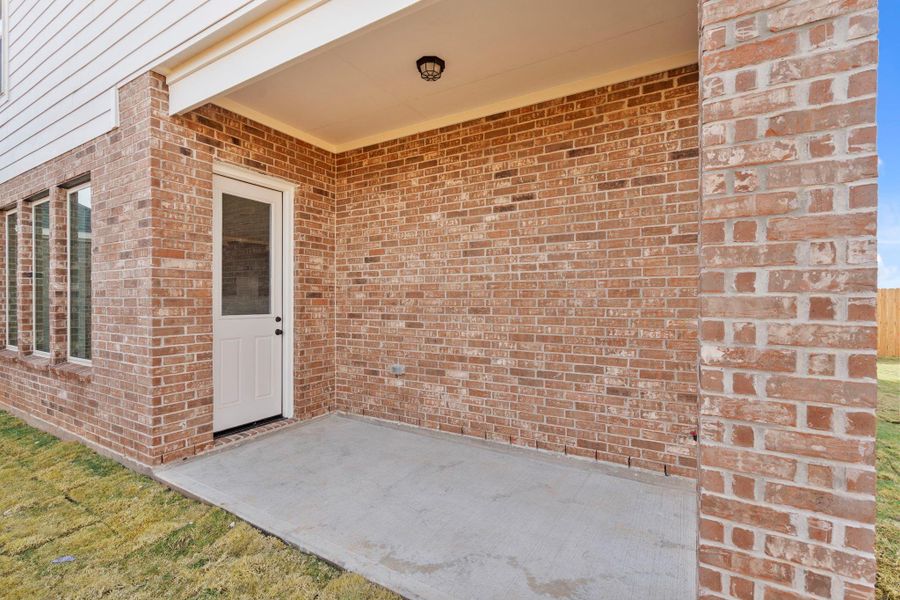 Enjoy outdoor living on the covered patio, ideal for meals, gatherings, or quiet relaxation.